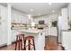 Well-designed kitchen with an island, stainless steel appliances, and a convenient breakfast bar at 11 Tanglewood Rd, Lake Wylie, SC 29710