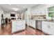 Elegant kitchen showcasing a kitchen island, stainless steel appliances, and hardwood floors at 11 Tanglewood Rd, Lake Wylie, SC 29710