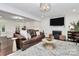 Inviting living room with a fireplace, hardwood floors, and stylish furnishings at 11 Tanglewood Rd, Lake Wylie, SC 29710