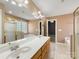 Bathroom featuring double sink vanity, tile flooring, separate glass shower, and soaking tub at 111 Forest Walk Way, Mooresville, NC 28115