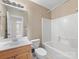 Bathroom featuring tub-shower combo, single vanity, and tile flooring at 111 Forest Walk Way, Mooresville, NC 28115