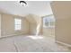 Spacious bedroom with carpet, dormer ceilings, and plenty of natural light at 111 Forest Walk Way, Mooresville, NC 28115