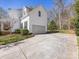 Home exterior features a two-car garage and long driveway at 111 Forest Walk Way, Mooresville, NC 28115