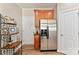 Kitchen featuring stainless steel refrigerator and lots of storage space at 12124 Red Rust Ln, Charlotte, NC 28277