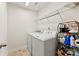 Laundry room features new washer and dryer and shelving at 12124 Red Rust Ln, Charlotte, NC 28277