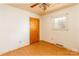 Cozy bedroom featuring hardwood floors, a ceiling fan, and a double-door closet at 126 Regal Cir # 2122, Mooresville, NC 28115