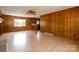 Comfortable living room featuring classic wood paneling and neutral flooring at 126 Regal Cir # 2122, Mooresville, NC 28115