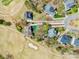 An aerial shot featuring the home's location on a golf course and nearby homes at 1316 Valhalla Dr, Denver, NC 28037