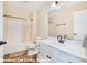 Clean bathroom featuring white fixtures and a shower-tub combo offers a functional and well-lit space with modern design at 1316 Valhalla Dr, Denver, NC 28037
