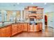 A chef's kitchen features custom cabinets, backsplash, stainless appliances, and stylish decor at 1316 Valhalla Dr, Denver, NC 28037