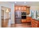 Featuring a stainless steel refrigerator and custom cabinets, this is a dream kitchen at 1316 Valhalla Dr, Denver, NC 28037