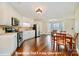 Second living quarters boasts a full kitchen and dining area, ideal for flexible living arrangements and entertaining at 1316 Valhalla Dr, Denver, NC 28037