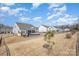 Backyard featuring a hot tub, screened in porch, large yard, and privacy fence at 1512 Brooksland Pl, Waxhaw, NC 28173