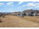 Large backyard featuring a hot tub, screened-in porch, privacy fence, and mature landscaping at 1512 Brooksland Pl, Waxhaw, NC 28173