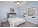 This bedroom includes two windows with wooden trimmed headboard at 1512 Brooksland Pl, Waxhaw, NC 28173