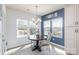 Cozy breakfast nook features a round table, natural light, and a view of the backyard, perfect for morning coffee at 1512 Brooksland Pl, Waxhaw, NC 28173