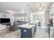 Spacious kitchen with an island and open floor plan, perfect for entertaining and modern living at 1512 Brooksland Pl, Waxhaw, NC 28173