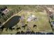 A sprawling estate with a pond, a house, a barn and a long drive that offers privacy and natural beauty at 1615 Stack Rd, Monroe, NC 28112