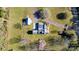 Top-down view of a house with a large yard, a detached garage, and a circular driveway at 1615 Stack Rd, Monroe, NC 28112