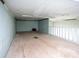 Unfinished attic with light green walls and white trim ready for customization at 1615 Stack Rd, Monroe, NC 28112