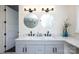 Stylish modern bathroom with marble countertop and dual sinks, bathed in natural light at 1615 Stack Rd, Monroe, NC 28112