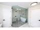 Contemporary bathroom featuring an elegant soaking tub inside a glass enclosed shower at 1615 Stack Rd, Monroe, NC 28112