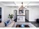 Cozy living room with white coffered ceilings, a brick fireplace, and stylish furnishings at 1615 Stack Rd, Monroe, NC 28112