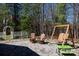 Backyard patio featuring flagstone, patio furniture, and flagpoles with ample space for outdoor enjoyment at 1717 Deer Run Rd, Catawba, SC 29704