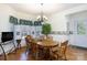 Bright dining room with hardwood floors, large table, and a chandelier at 1717 Deer Run Rd, Catawba, SC 29704