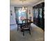 Formal dining room featuring a chandelier, dark wooden furnishings and decor at 1912 Darbywine Dr, Charlotte, NC 28216