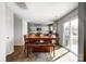 Bright dining area features a large table and hardwood floors at 2135 Eastway Dr, Dallas, NC 28034