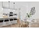 Stylish kitchen with sleek white cabinets, quartz countertops, and stainless steel appliances, perfect for modern living at 2544 Pinestream Dr, Charlotte, NC 28216