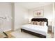 Comfortable bedroom featuring a well-lit space, contemporary design, and a calming atmosphere for relaxation at 2544 Pinestream Dr, Charlotte, NC 28216