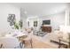 Bright living room with neutral furniture, modern decor, and large windows. Great space for entertaining at 2544 Pinestream Dr, Charlotte, NC 28216