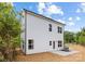 A two-story home with white siding and a well-maintained backyard at 2544 Pinestream Dr, Charlotte, NC 28216