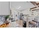 Modern kitchen with stainless steel appliances, granite countertops, and wood beam accents at 2604 Lamplighter Dr, Kannapolis, NC 28081