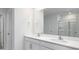 Bright bathroom features a double sink vanity and large mirror at 3044 Ora Smith Rd, Lincolnton, NC 28092