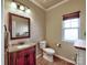 Charming bathroom with stylish vanity, neutral color palette, and a window for natural light, creating a relaxing space at 3426 Dominion Green Dr, Charlotte, NC 28269