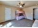 Bedroom featuring bunkbeds and a ceiling fan at 3426 Dominion Green Dr, Charlotte, NC 28269