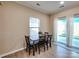 Cozy breakfast nook with natural light, sliding glass door and views of the outdoors, ideal for morning coffee at 3426 Dominion Green Dr, Charlotte, NC 28269