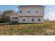 Large backyard with chairs on the porch at 353 Webb Farm Rd, Shelby, NC 28152