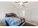 Comfortable bedroom with ceiling fan, neutral walls, plush carpeting and bright natural light at 353 Webb Farm Rd, Shelby, NC 28152