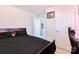 Nicely staged bedroom featuring black furniture, black accents, soft carpet, and a view to the next room at 353 Webb Farm Rd, Shelby, NC 28152