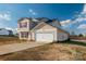 Charming two-story home features attached garage, and well-manicured lawn at 353 Webb Farm Rd, Shelby, NC 28152