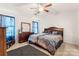 Tranquil bedroom with wood furniture, ceiling fan, and plush carpeting, perfect for relaxation at 353 Webb Farm Rd, Shelby, NC 28152