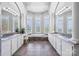 Dual sink bathroom with soaking tub and views at 447 Willow Pond Ln, Hiddenite, NC 28636