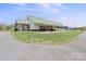 Barn exterior with deck and attached building at 447 Willow Pond Ln, Hiddenite, NC 28636