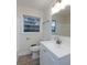 Bright bathroom featuring new fixtures, a vanity, and plenty of natural light at 4601 Mendham Dr, Charlotte, NC 28215