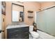 Bathroom featuring a vanity with a marble countertop, framed mirror, and a shower-tub combination at 4741 Eaves Ln, Charlotte, NC 28215