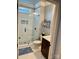 Modern bathroom featuring a glass-enclosed shower with tiled walls and a sleek vanity at 6111 Gold Springs Way, Denver, NC 28037